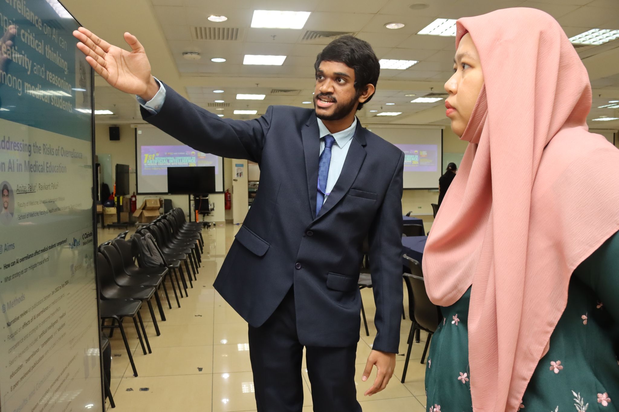 Anitej presenting to the chairperson of AIMEC 2024.
