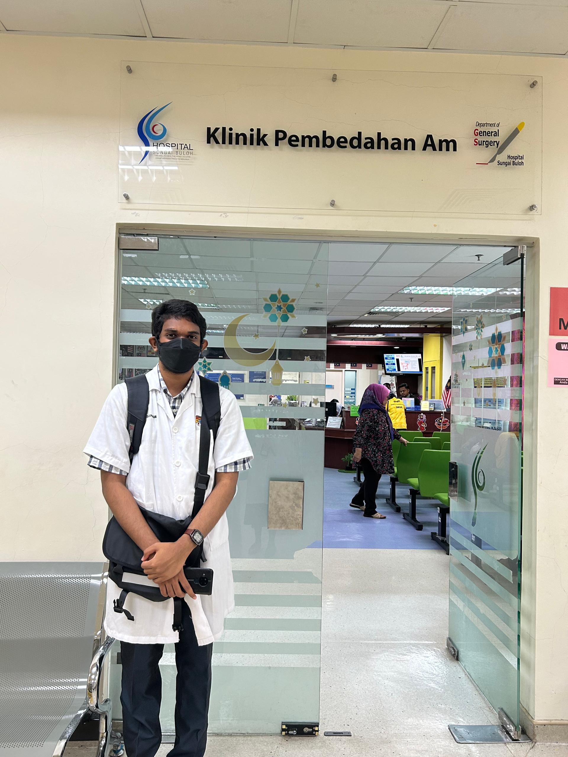 Anitej standing outside the General Surgery clinic.