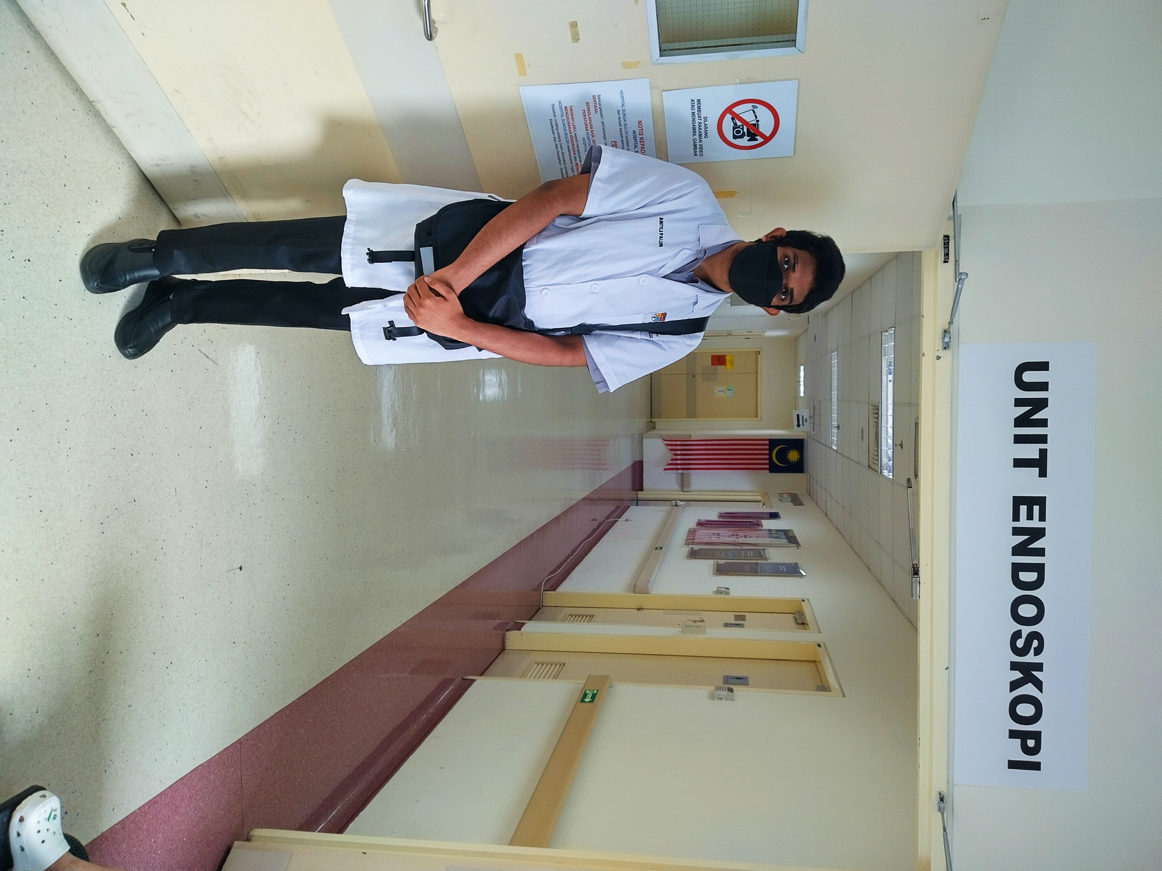 Anitej standing outside the Endoscopy Unit.