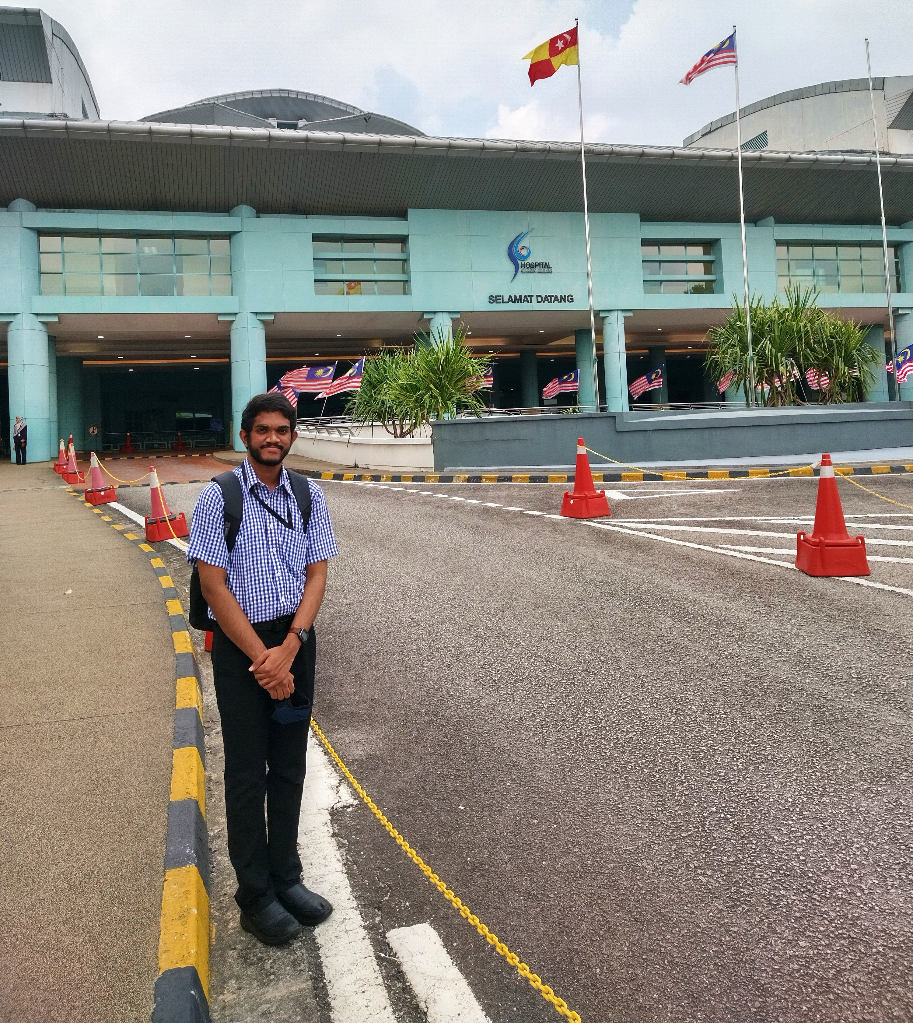 Anitej standing outside HSB.
